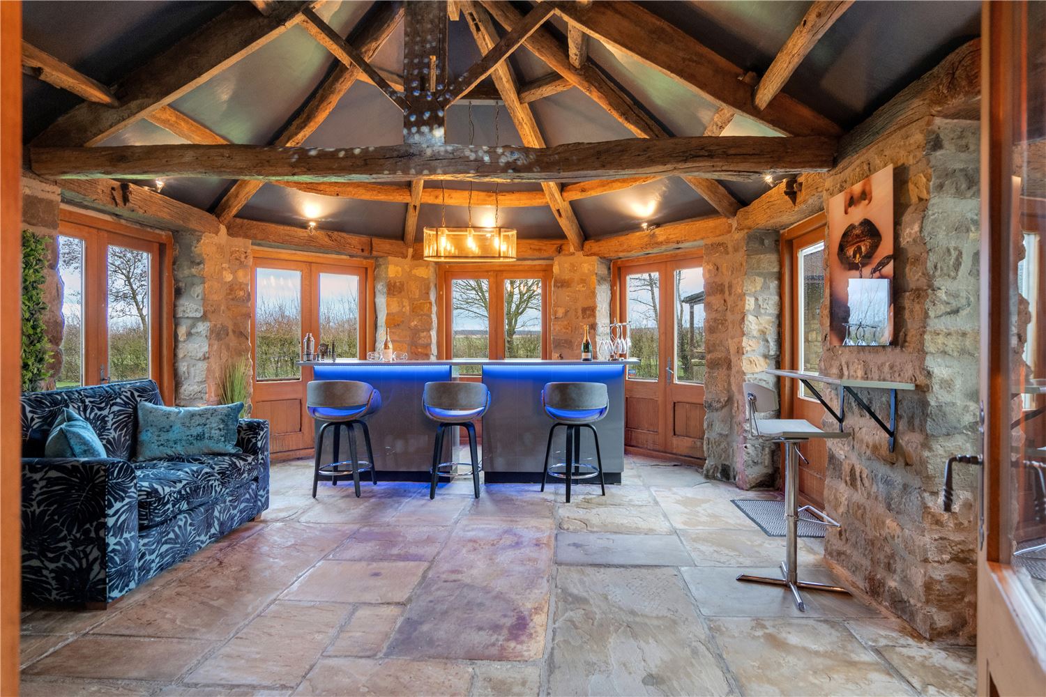 garden room with cocktail bar and seating