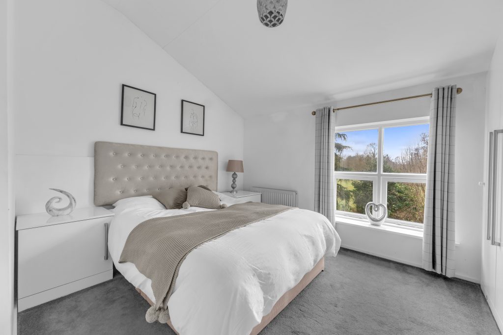 A photograph of a secondary double bedroom at the Manchester House Retreat