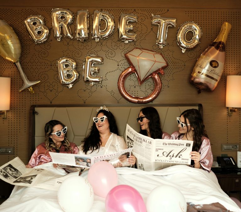 a bride surrounded by her hen's dressed up