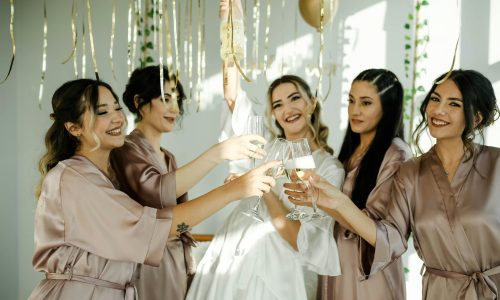 a bride surrounded by her hen party